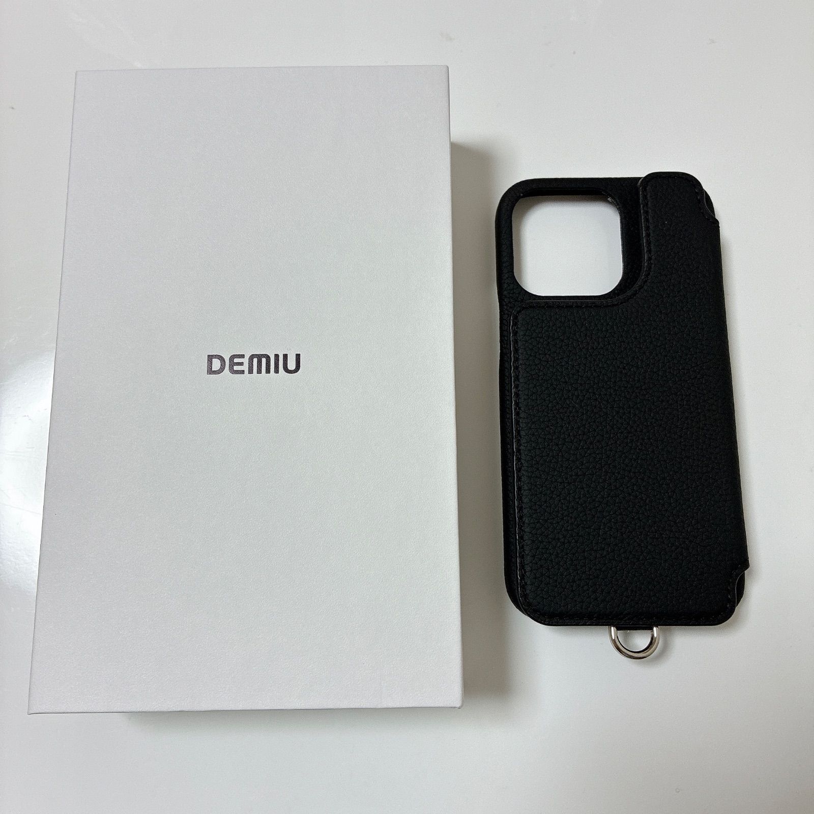 【新品未使用】DEMIU ブラックスタッズiPhone13PRO デミウルーボ iPhone13Pro】 DEMIU デミュウ レザースマートフォンケース BALLON