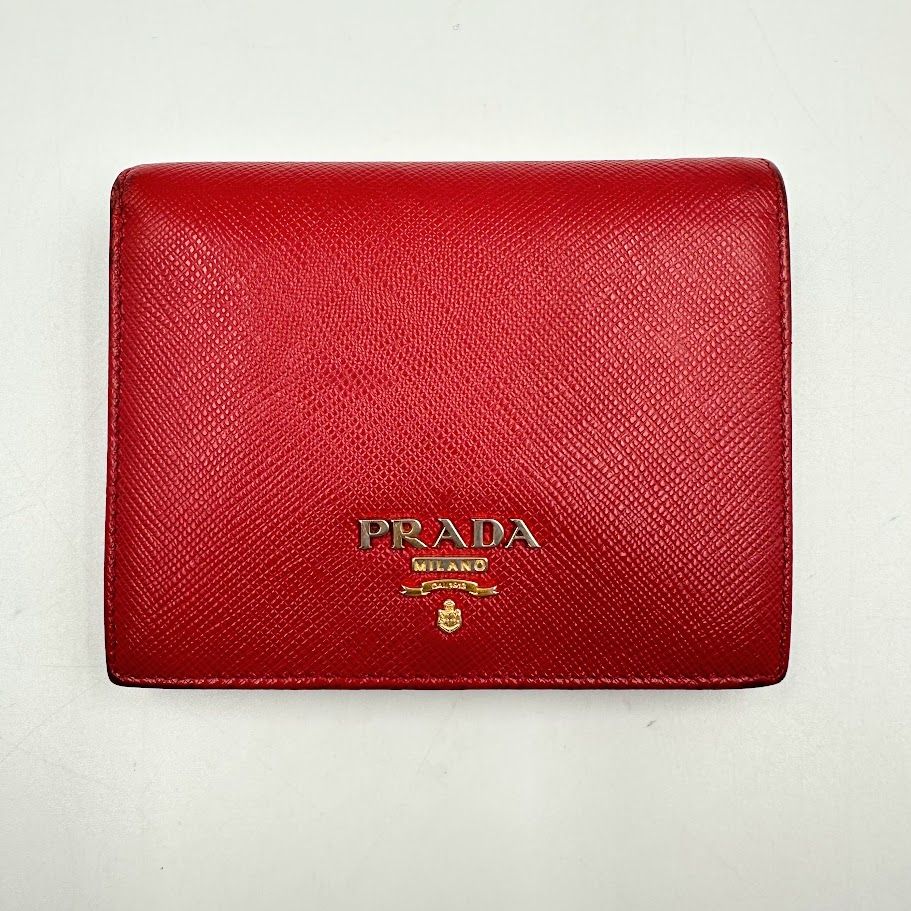 PRADA プラダ 折り財布 赤 サフィアーノ - メルカリ