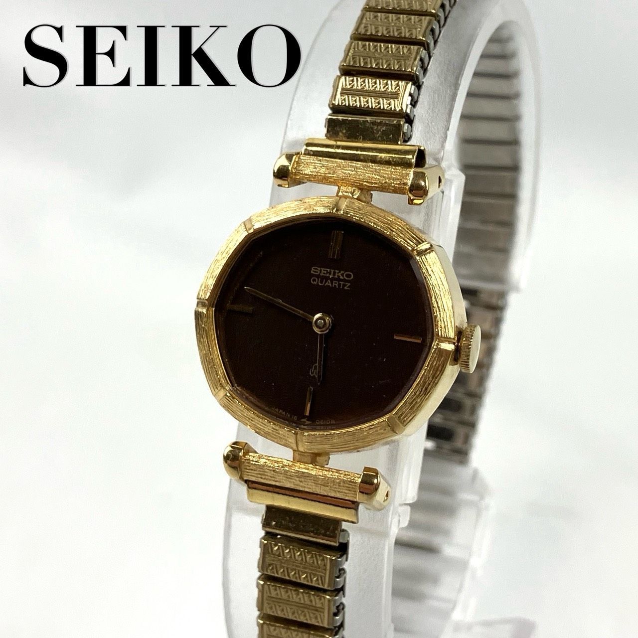 稼働品 電池交換済み ヴィンテージ品 SEIKO セイコー 腕時計 アナログ 旧クオーツマーク 黒文字盤 金属ベルト 蛇腹ベルト 2針 ゴールド