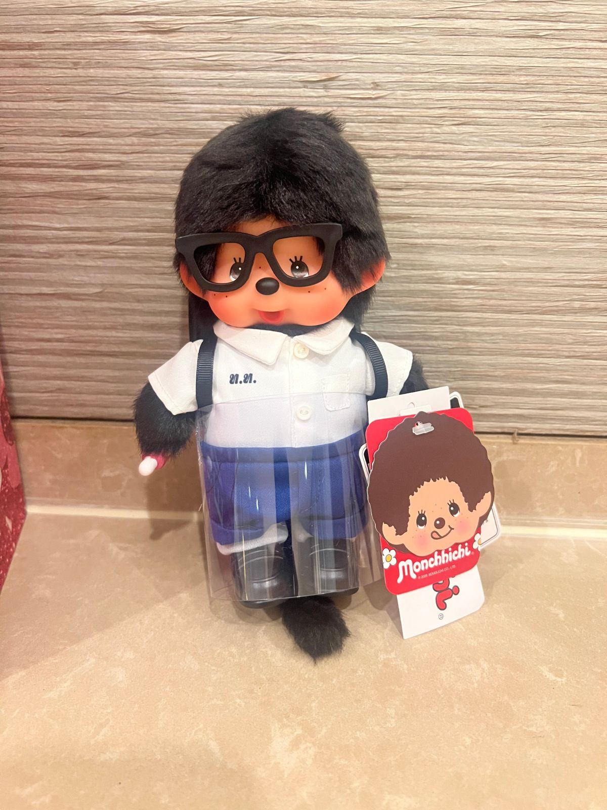 海外限定 モンチッチ タイ ベビチッチタイの男と女子学生 海外限定