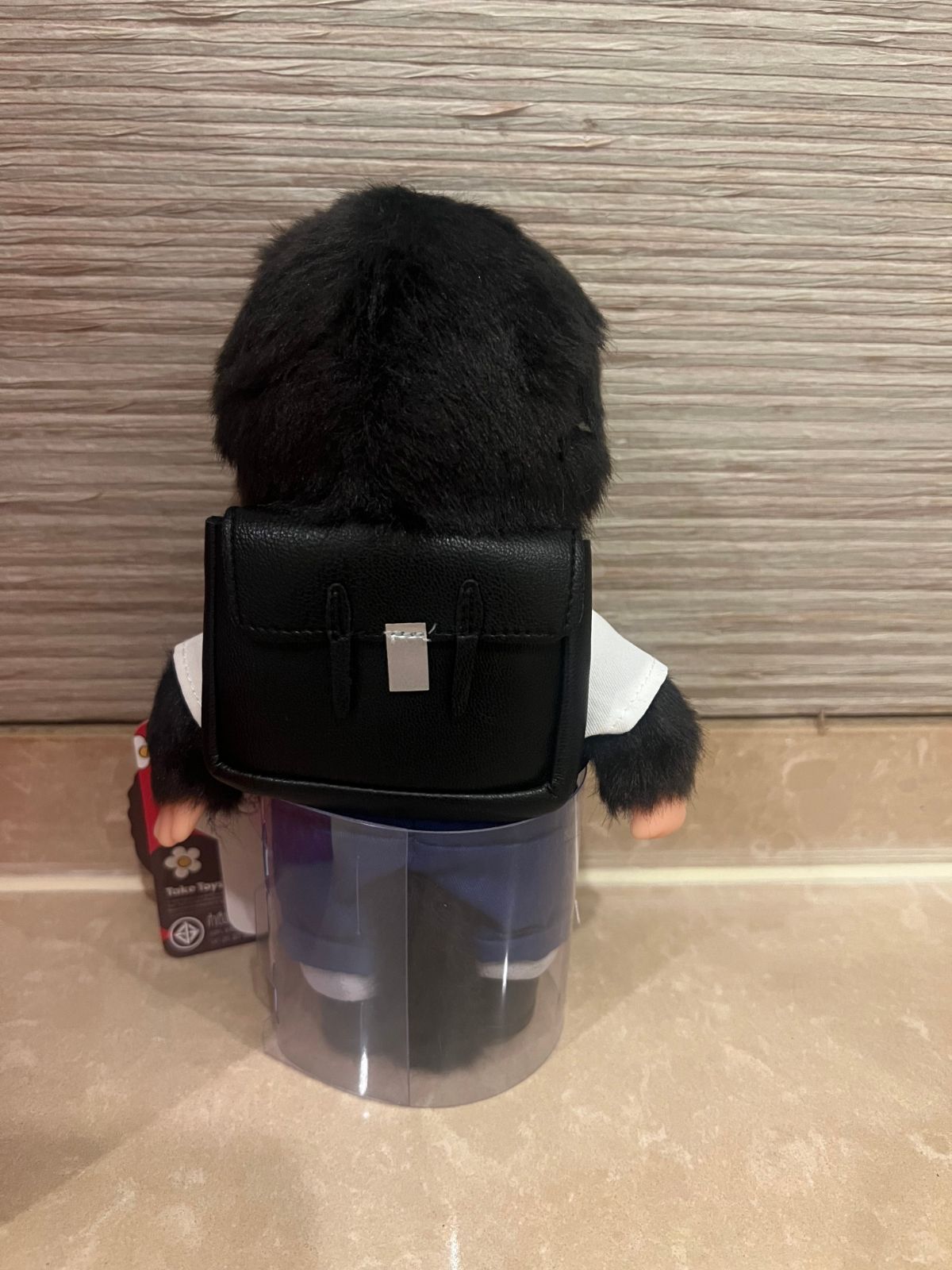 タイ モンチッチ 学生 ぬいぐるみ の男の子 タイのモンチッチpopupストアで した