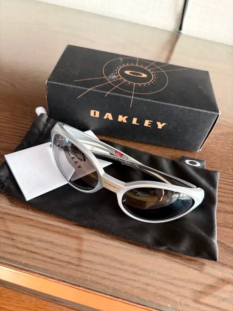 OAKLEY オークリー アイ ジャケット REDUX シルバー フレーム プリズム ブラック ポラライズド レンズ ハイ