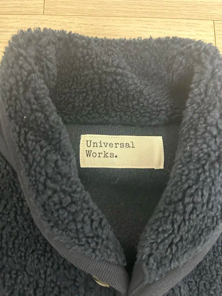 ユニバーサルワークス フリース ジャケット