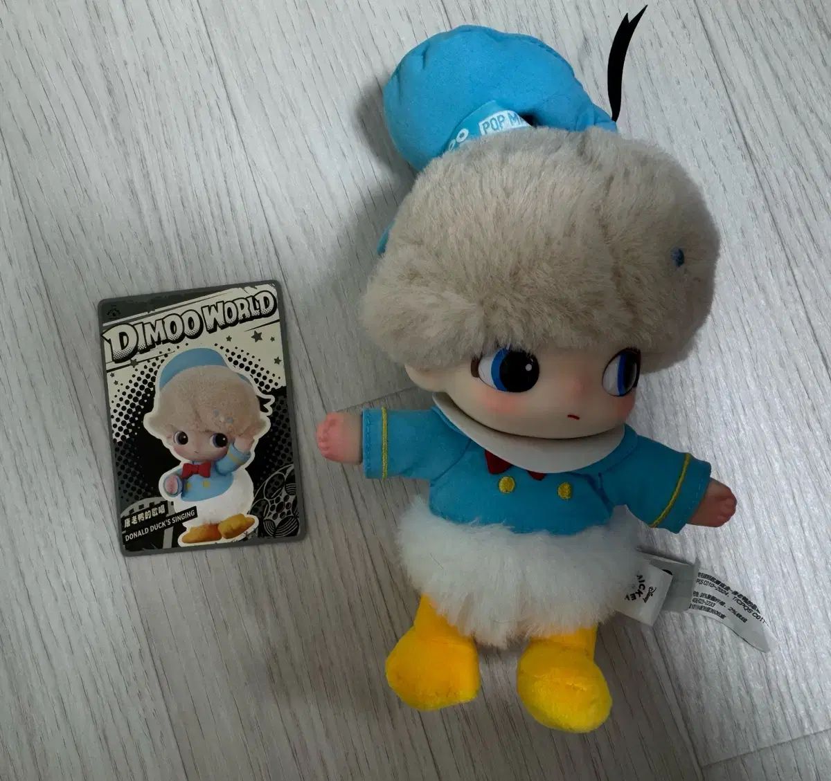 ポップマート DIMOO WORLD x ディズニー ドナルドダックの曲 - メルカリ