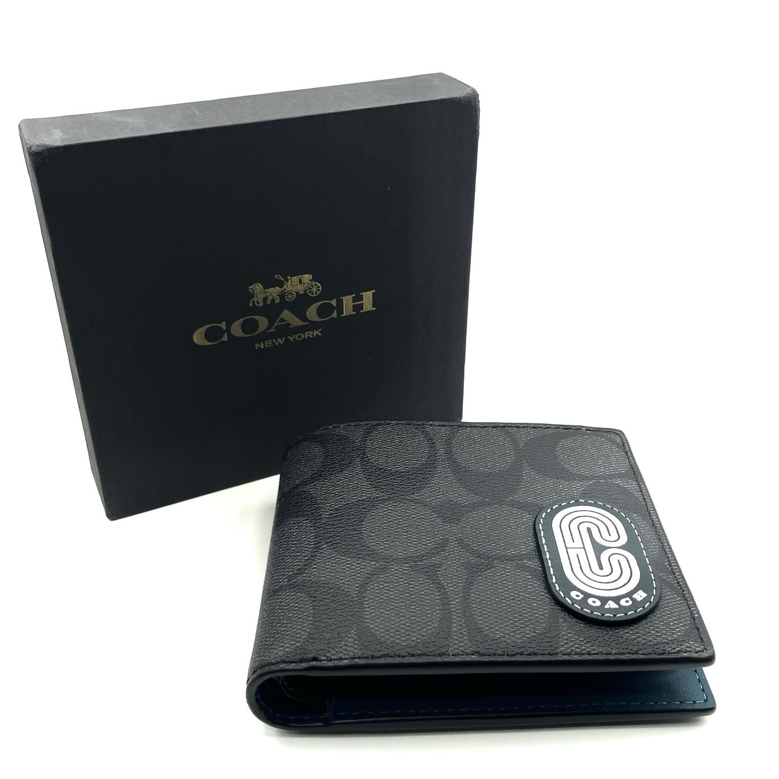 COACH (コーチ) 二つ折り財布 シグネチャー ブラック - メルカリ