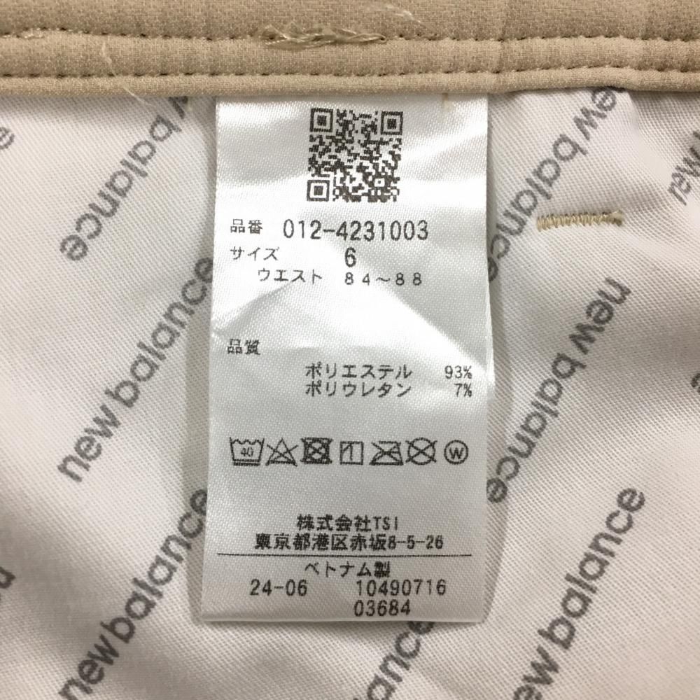美品】ニューバランスゴルフ パンツ ベージュ ジップライン蛍光