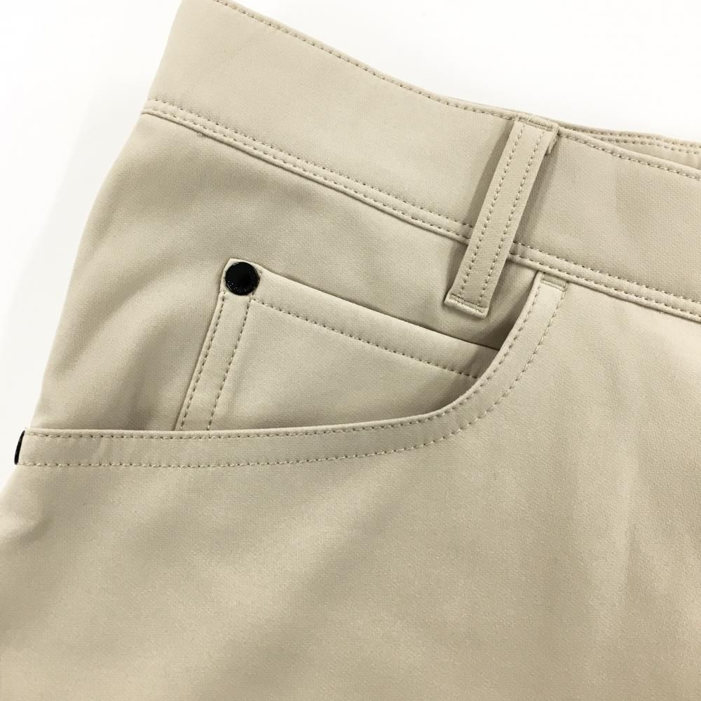 美品】ニューバランスゴルフ パンツ ベージュ ジップライン蛍光