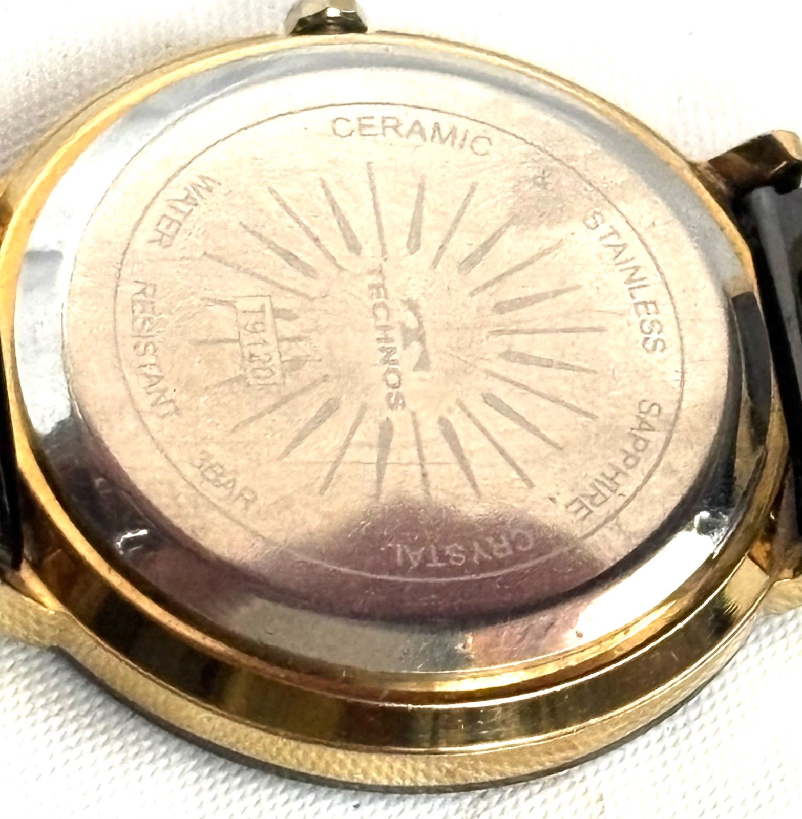 美品 TECHNOS T9120 テクノス セラミック デイト QZ 黒文字盤 メンズ 