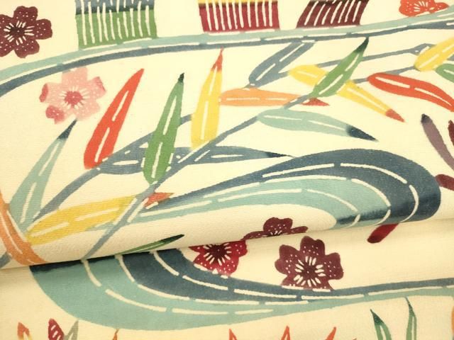 流水に草花と燕柄　染めと絞りの美しい紬名古屋帯 帯のアトリエ花邑-hanamura- 銀座店 「流水に草花文様 型染め 名古屋帯」