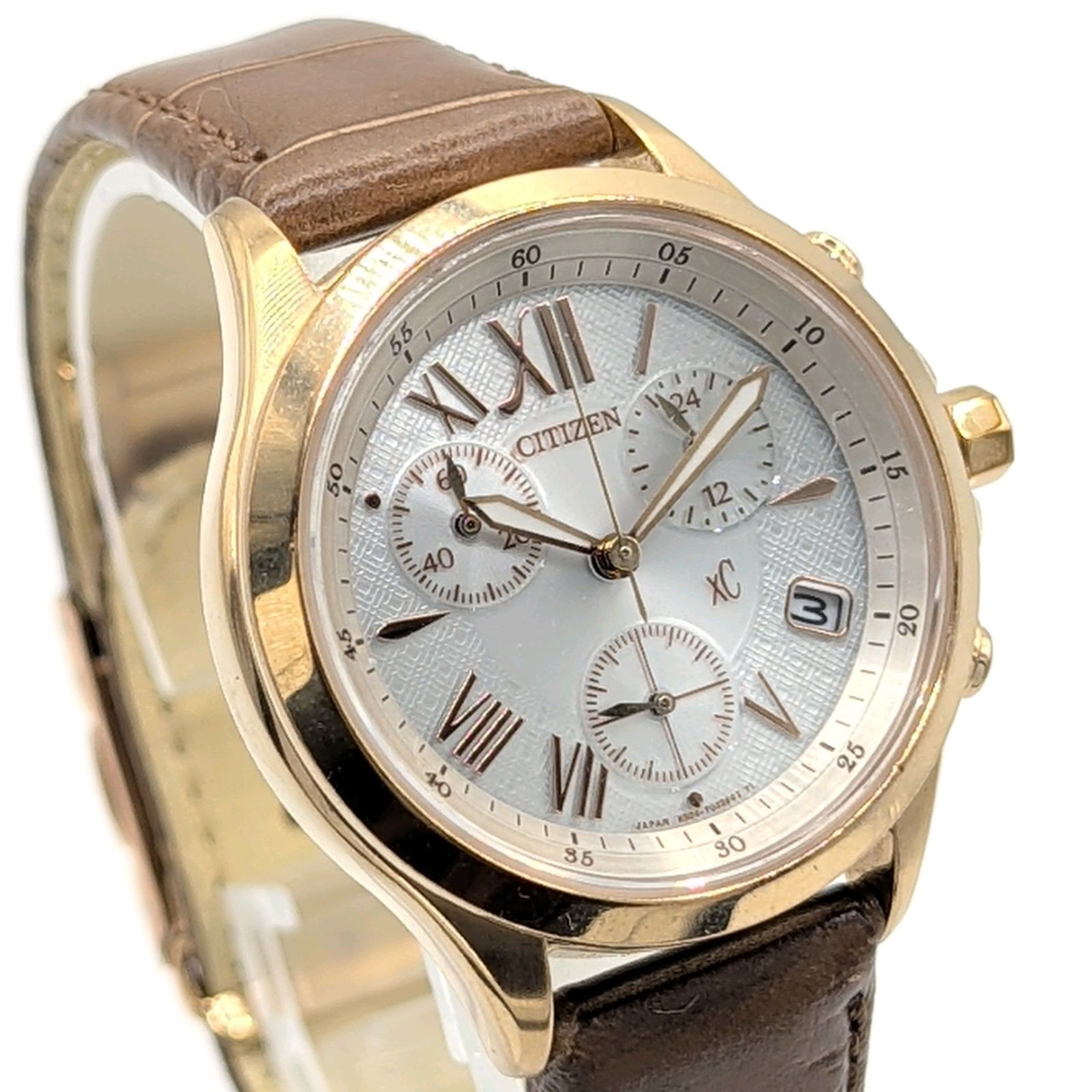 CITIZEN xC H 504 T 021298 Watch Ladies Solar Round G Date chronograph Not Working シチズン クロスシー レディース 時計 電波ソーラー ラウンド ゴールド クロノグラフ 不動品