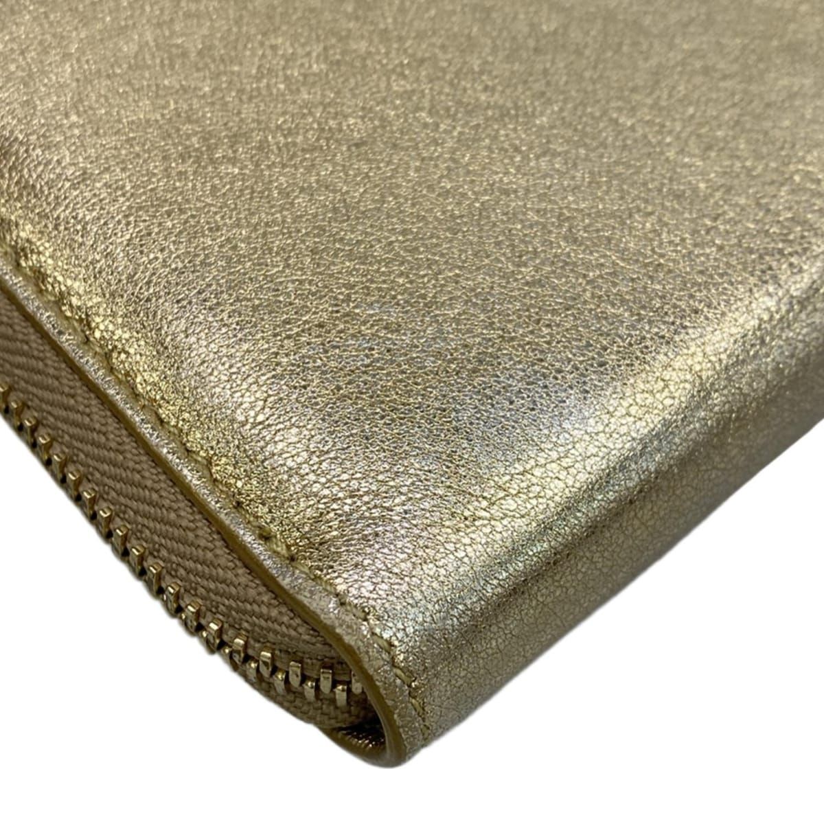 JIMMY CHOO(ジミーチュウ) 長財布 - ゴールド ラウンドファスナー