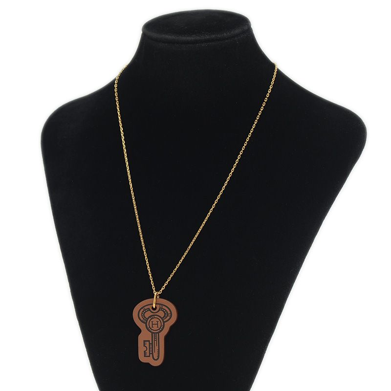 エルメス Hキュリオジテ クレPM ネックレス メタル/スイフト ブラウン