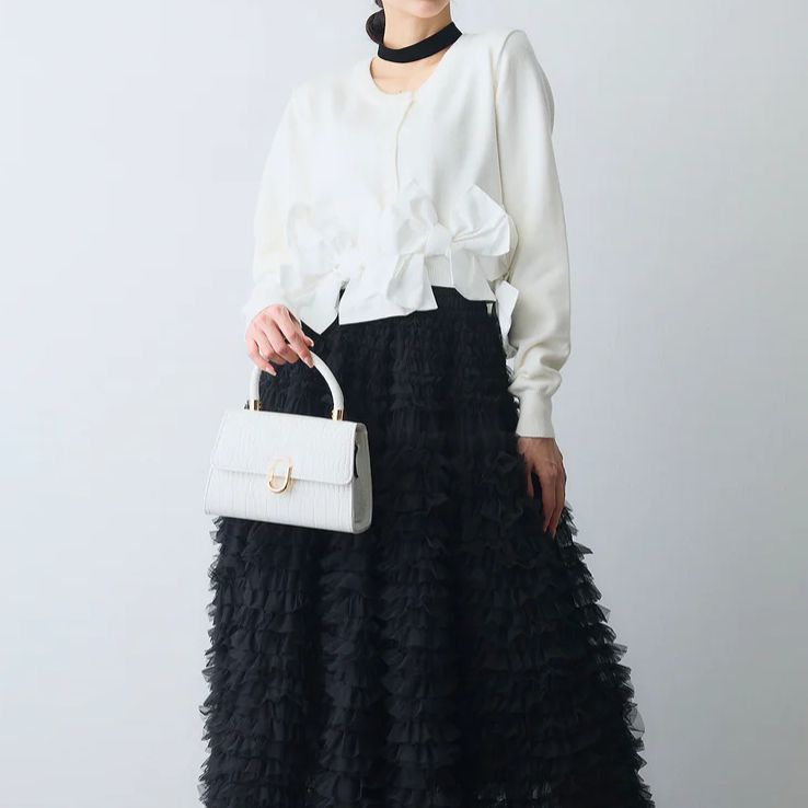 ヘムリボンデザインショートカーデ - メルカリ