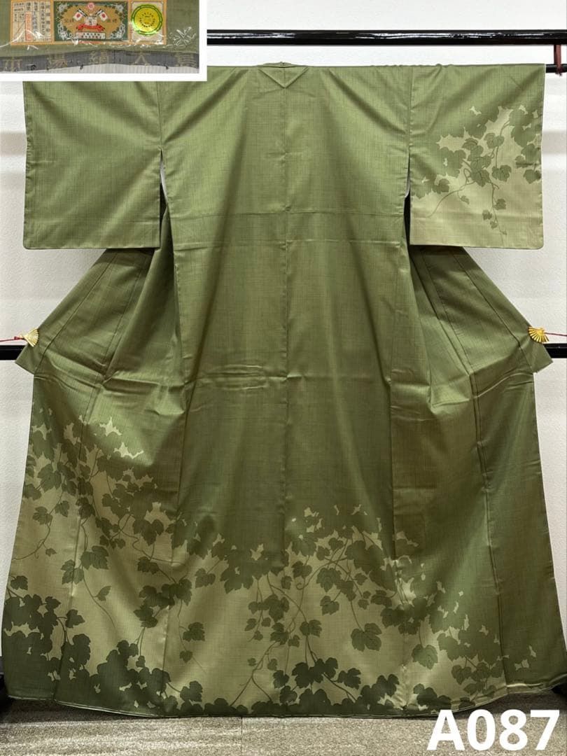 927☆本場泥染大島紬「さが美扱い」花唐 躾糸付未着用 身丈