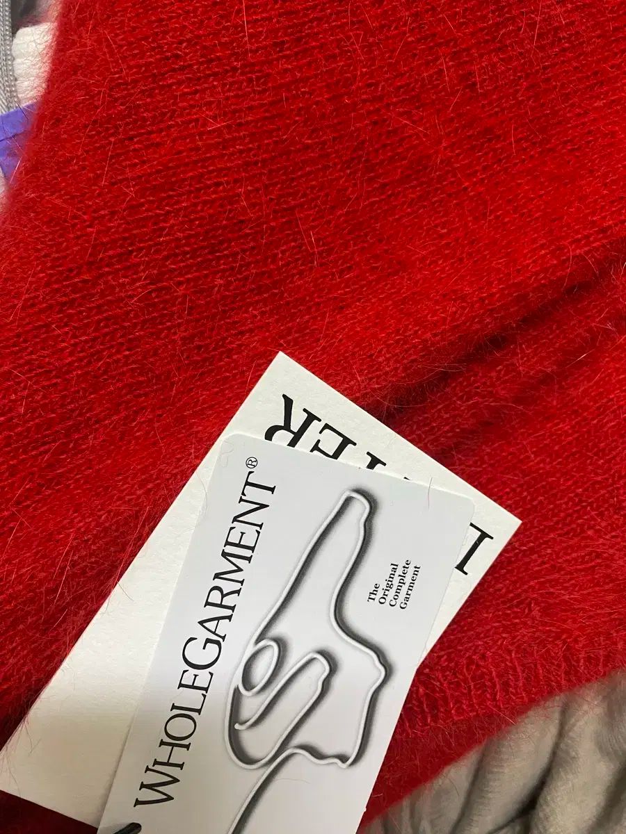 レター キャロル ホールガーメント ニット レッド