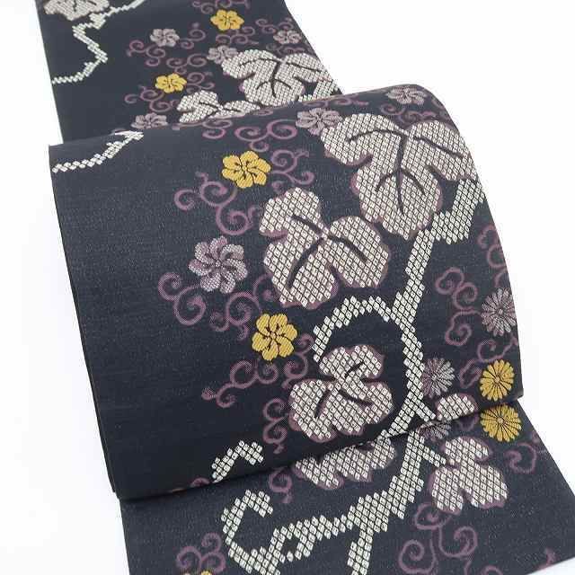 美しさを曲線に乗せて届ける洒落た目覚め 袋帯