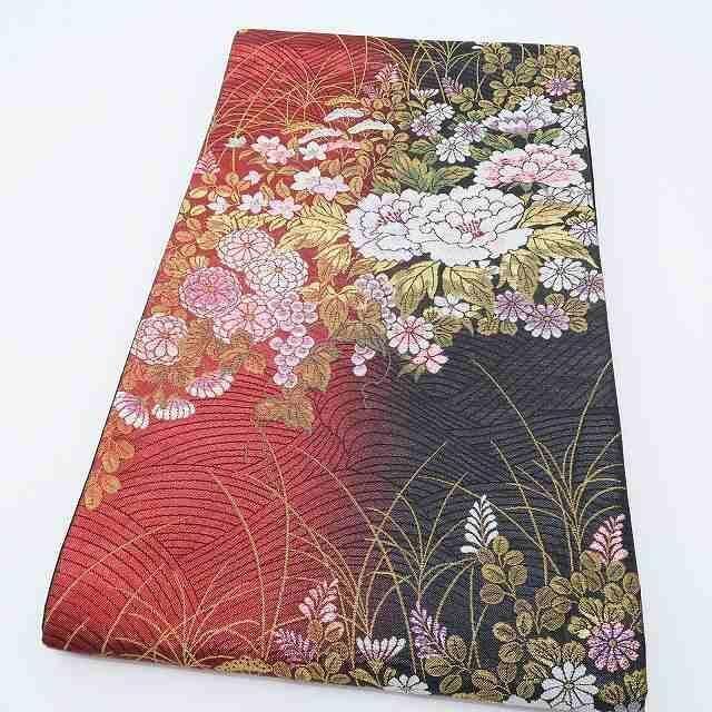 牡丹や葡萄と一緒にエッジの効いた波に乗る 振袖用袋帯