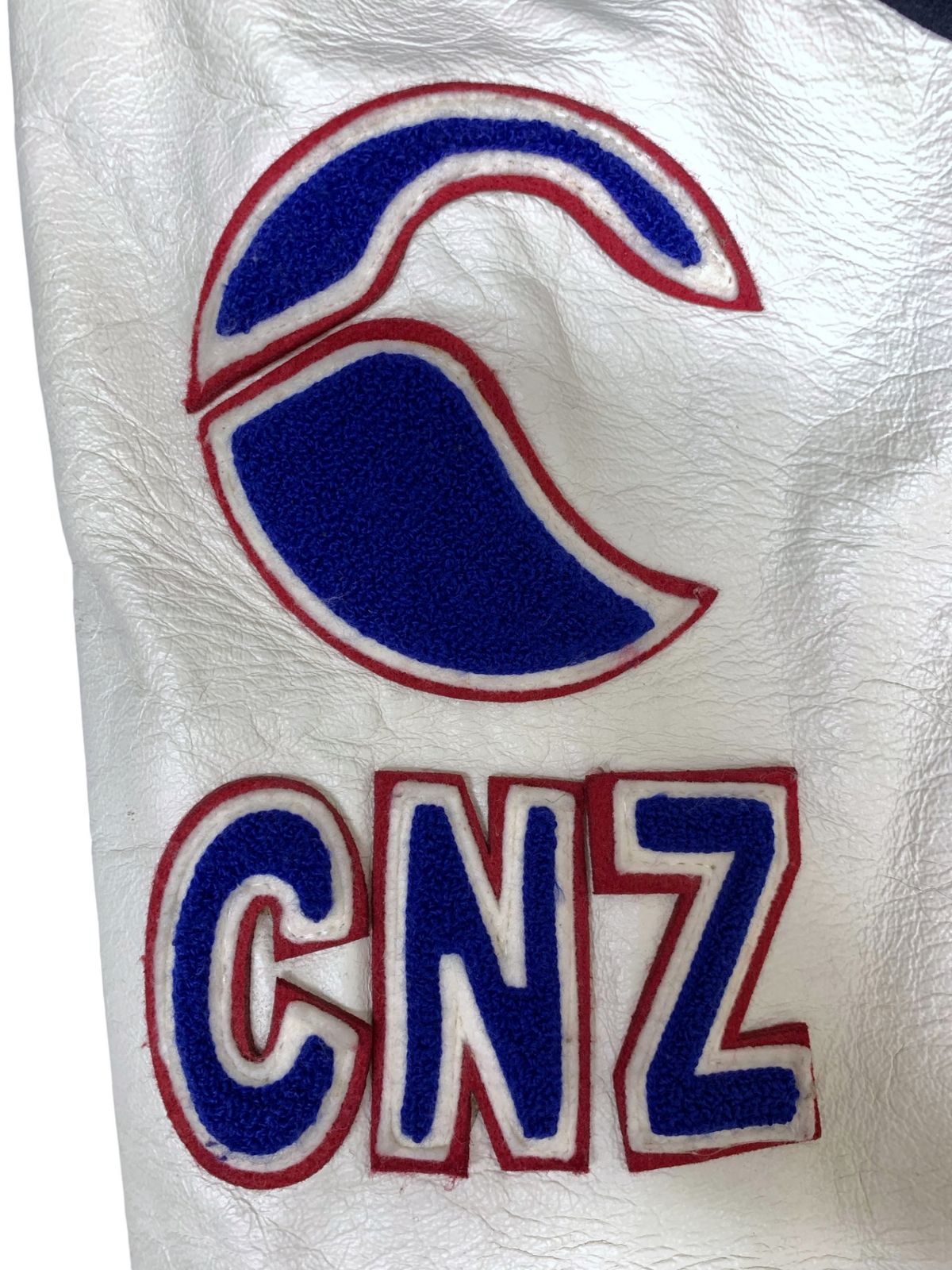 canterbury (カンタベリー) スタジャン 袖切り替え レザー ワッペン RA