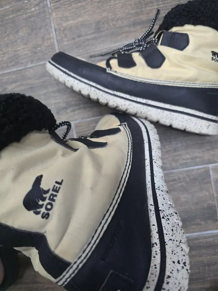 ソレル 防寒 ブーツ アイボリー ブラック レディース