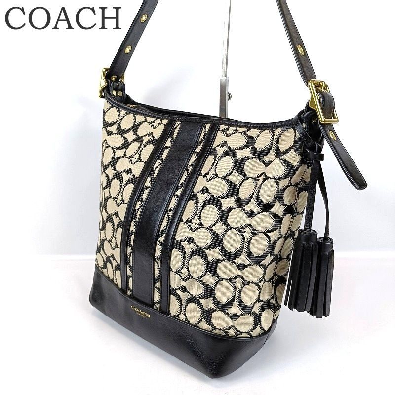 美品 COACH コーチ ショルダーバッグ タッセル 斜めがけ シグネチャー 