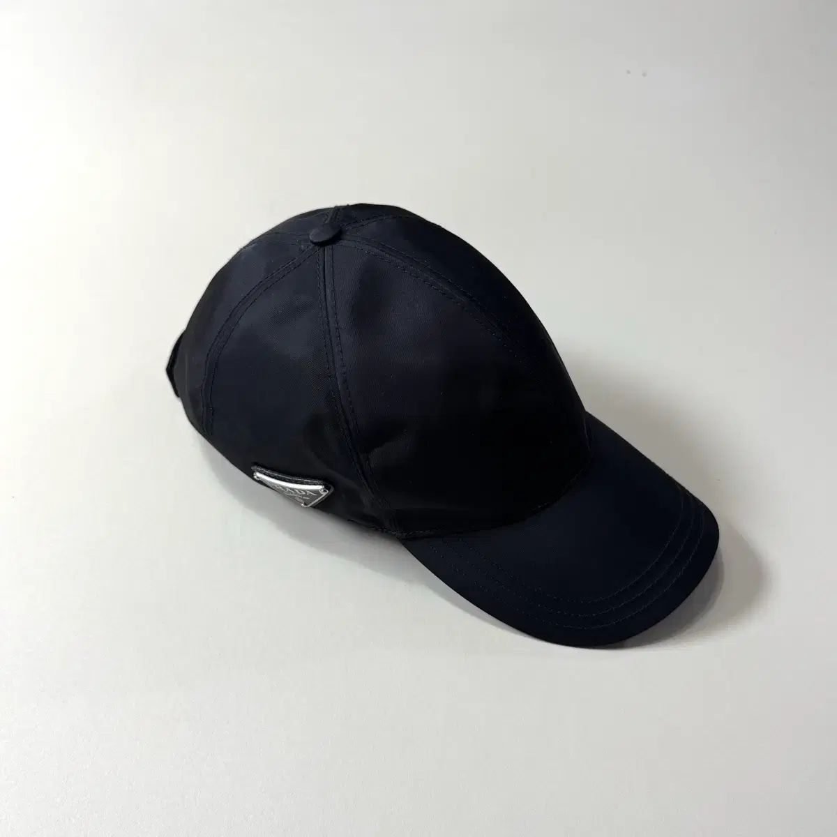 L|59 プラダ 三角ロゴ リナイロン ベースボールキャップ
