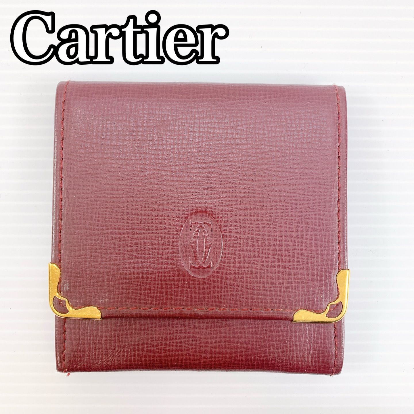 H-149 カルティエ Cartier 小銭入れ ボルドー系 レザー 丸型ロゴ