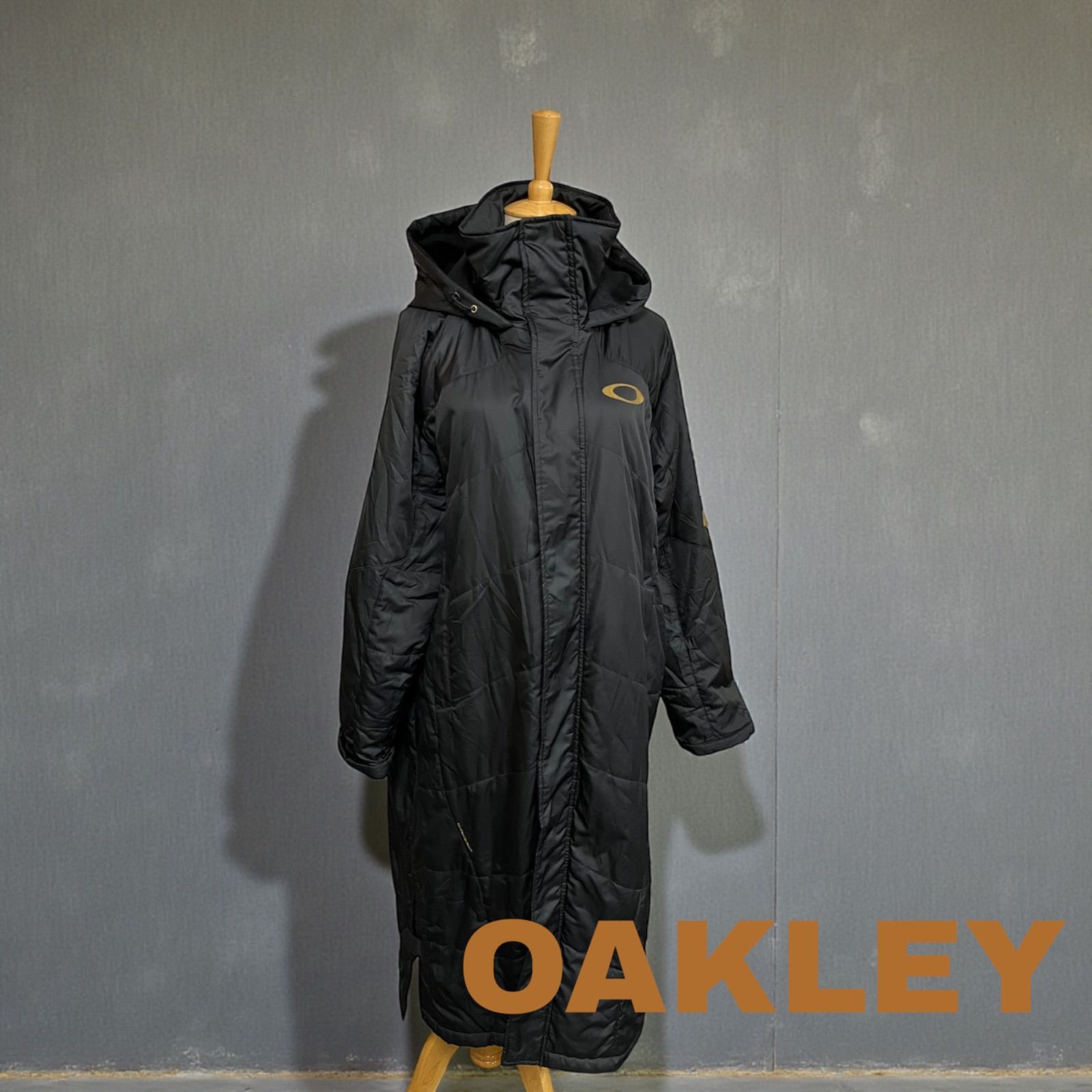 OAKLEY フード付きロングコート ブラック スポーツウエア ベンチコート