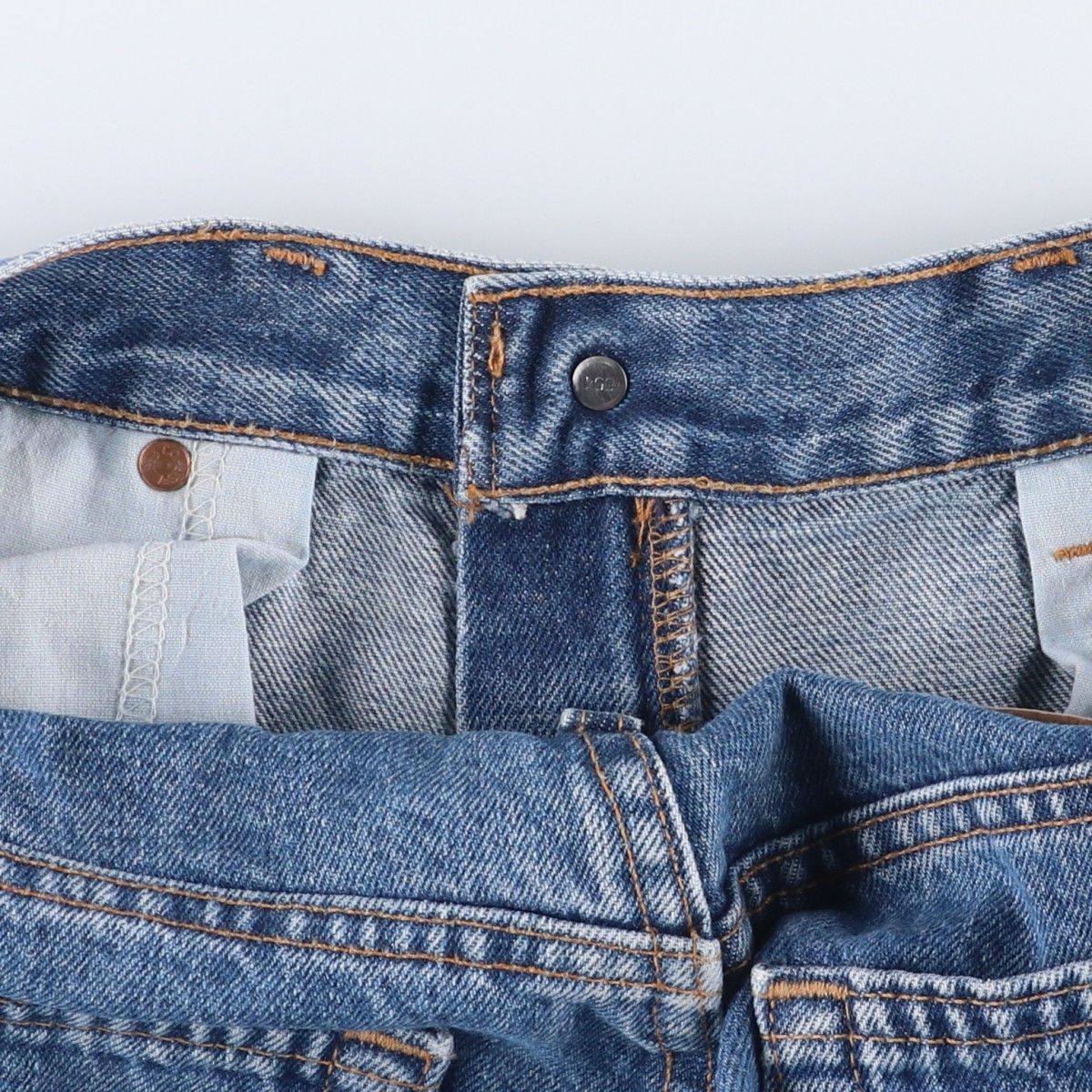 テーパードデニムパンツ