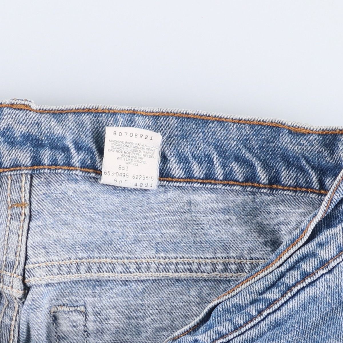 テーパードデニムパンツ