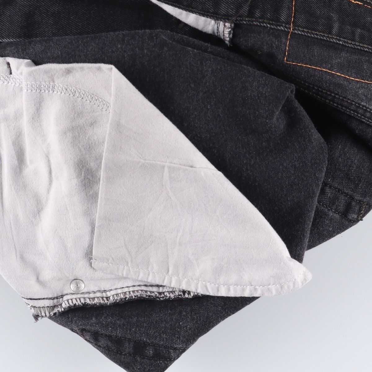 テーパードデニムパンツ