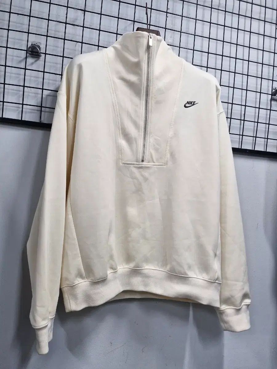 100 L NIKE サーカ ハーフジップアップ スウェット