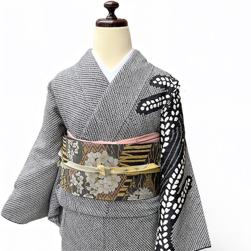 袋帯 フォーマル 新小石丸 貝紫 正絹 六通柄 灰黒 金 松皮菱 花の丸文