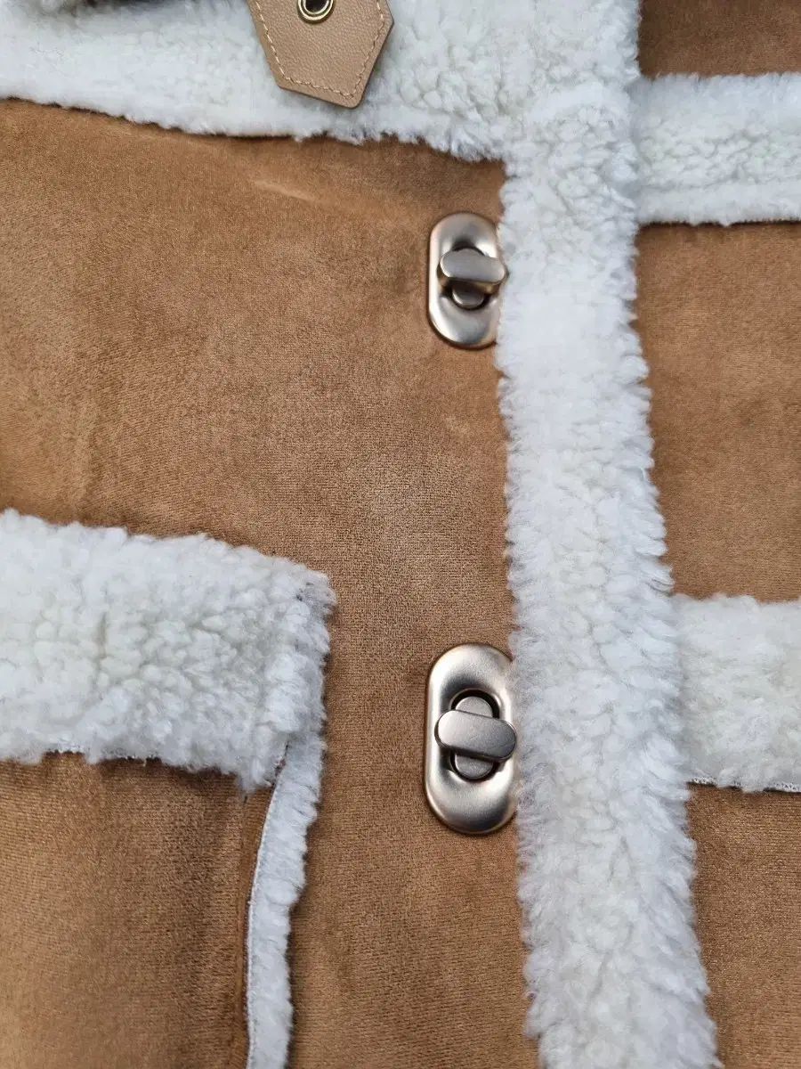 エゴイスト ムートン クロップド ベスト 55