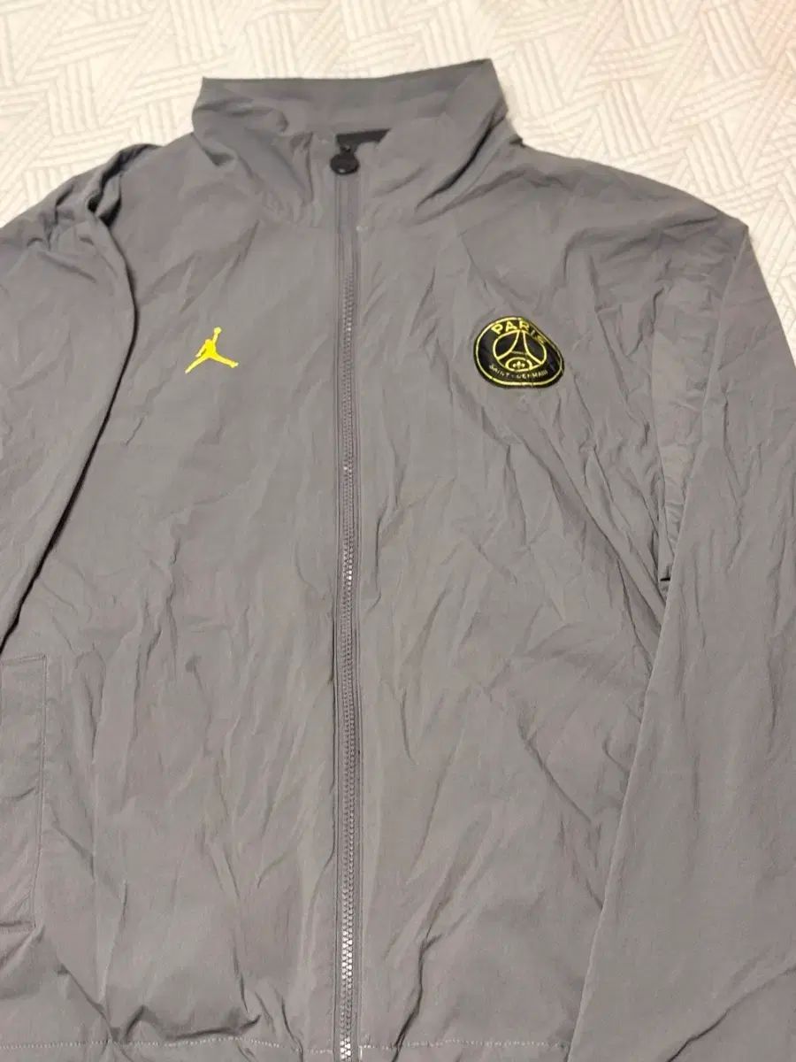 ジョーダン x パリ サンジェルマン 23-24シーズン ウーブン ジャケット