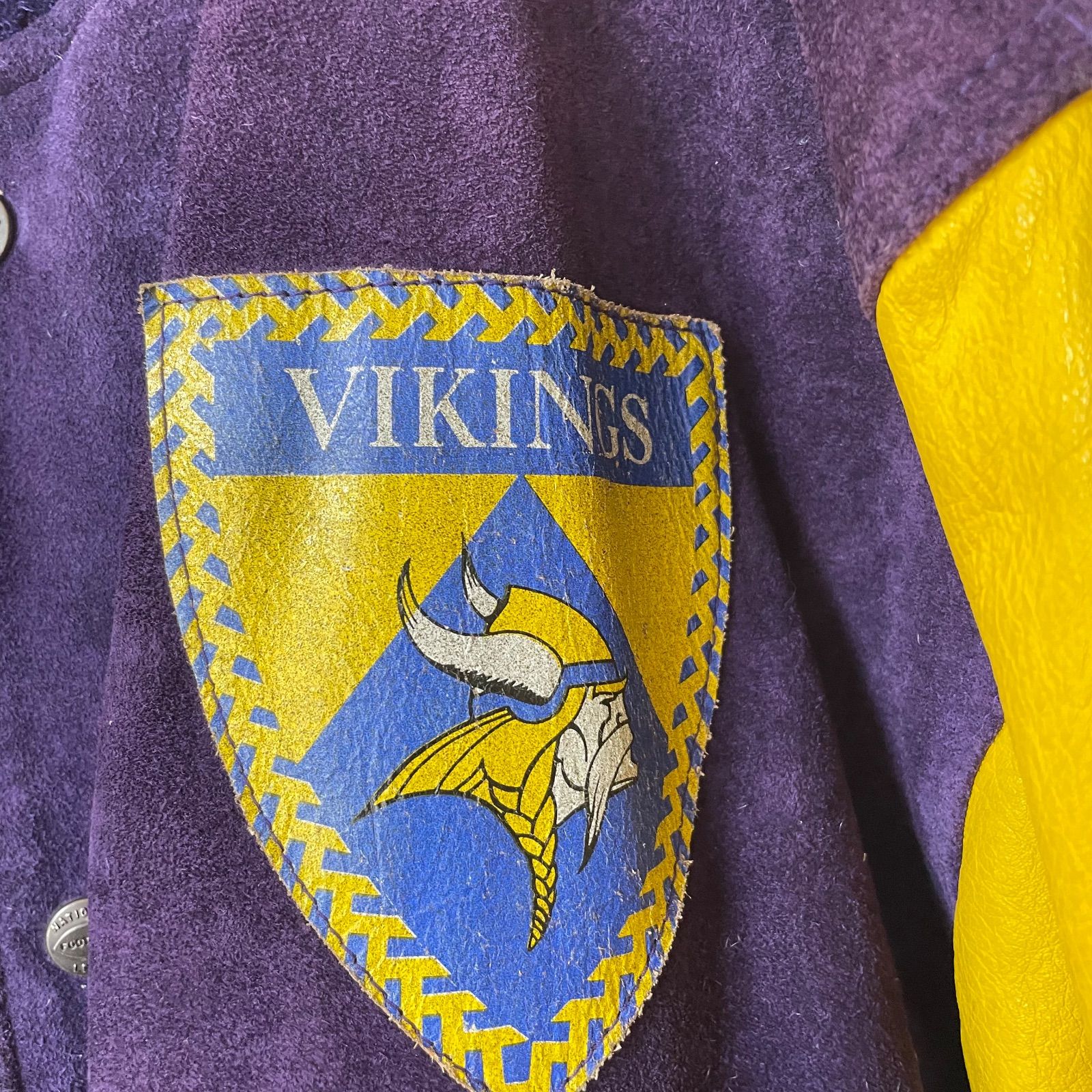 NFLミネソタ.バイキングス フェイクレザースタジアムジャケット 古着