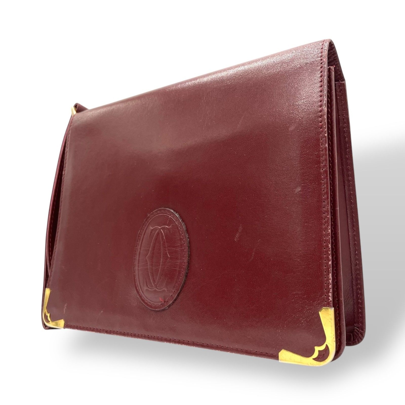 Cartier カルティエ ボルドー レザー クラッチバッグ ゴールドロゴ