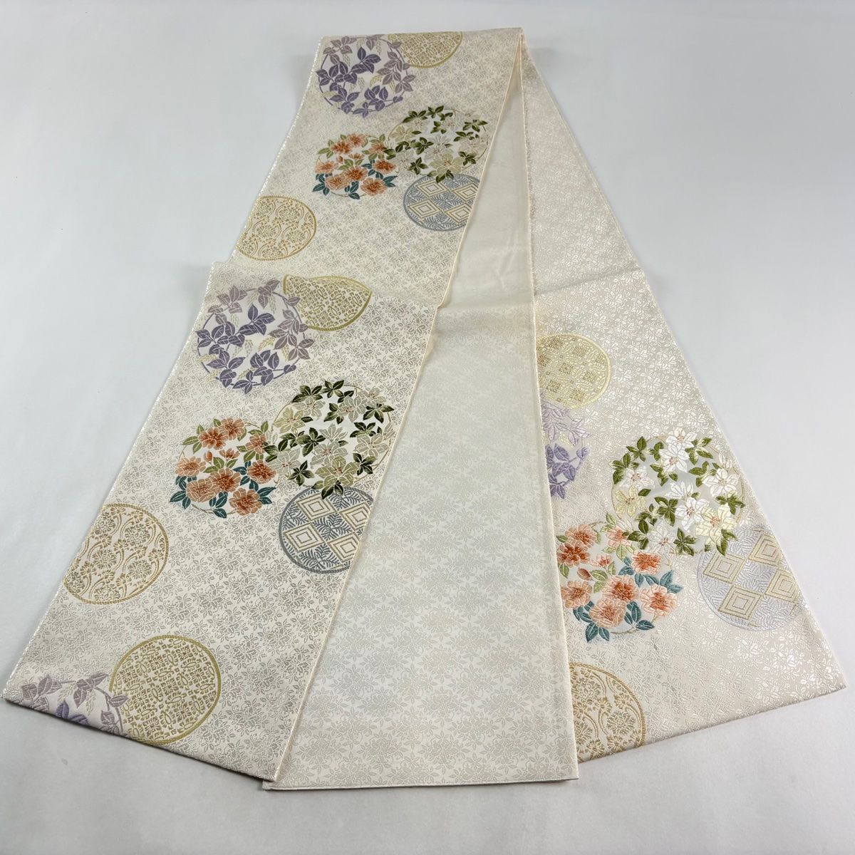 美品】 袋帯 逸品 新小石丸 花丸文 入子菱 御印華唐織 金糸 灰白 六通