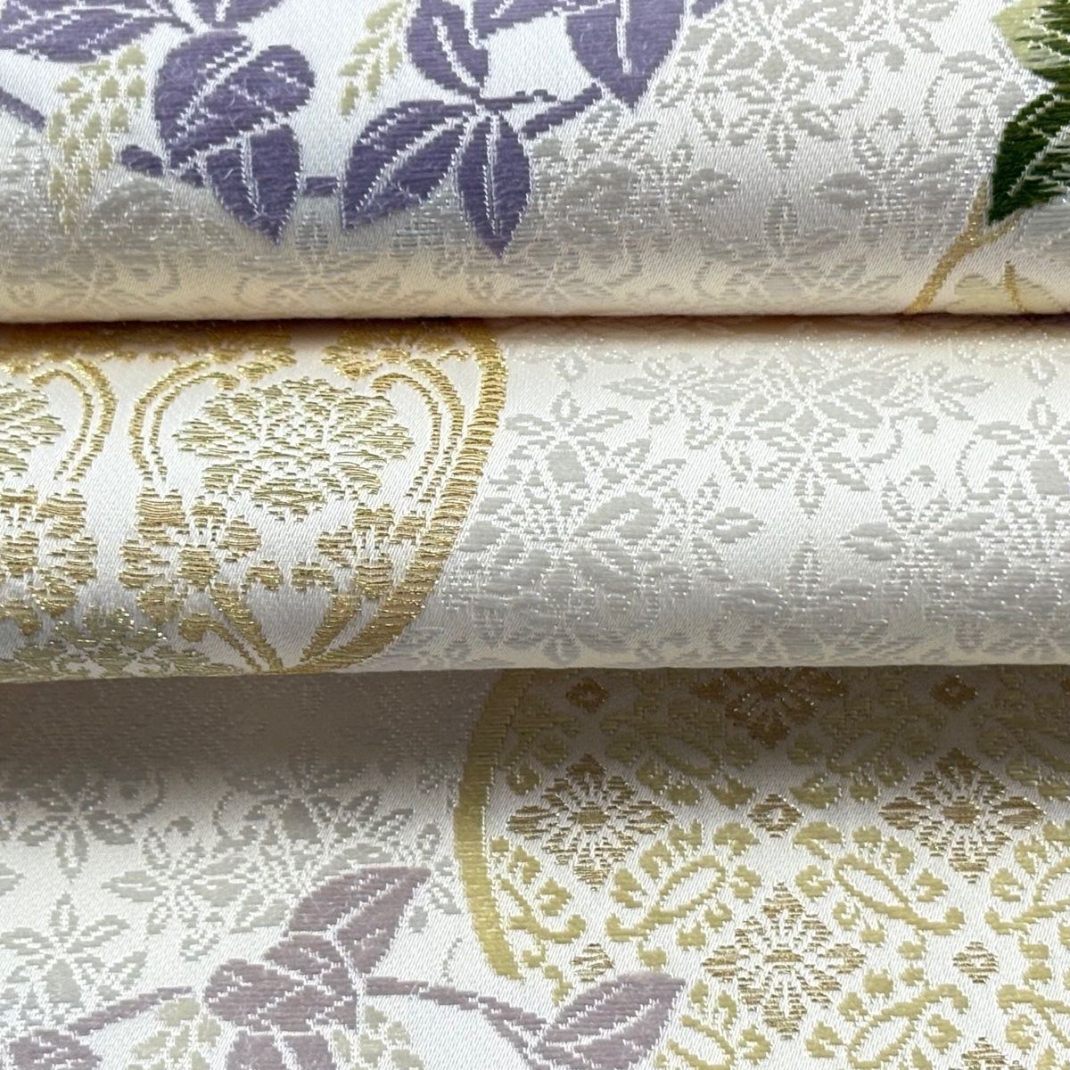 美品】 袋帯 逸品 新小石丸 花丸文 入子菱 御印華唐織 金糸 灰白 六通