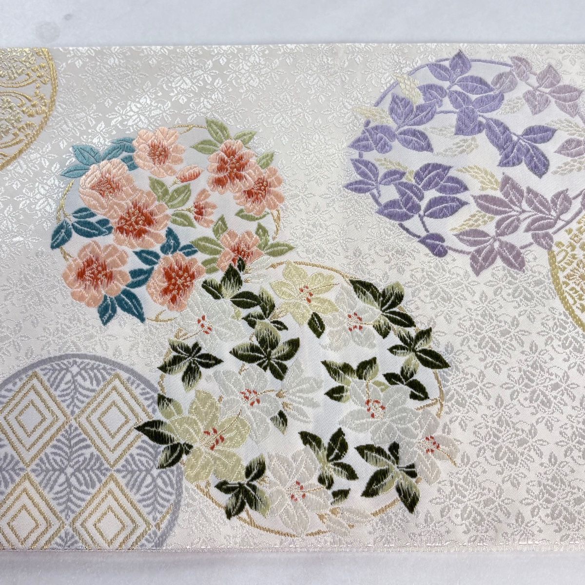 美品】 袋帯 逸品 新小石丸 花丸文 入子菱 御印華唐織 金糸 灰白 六通