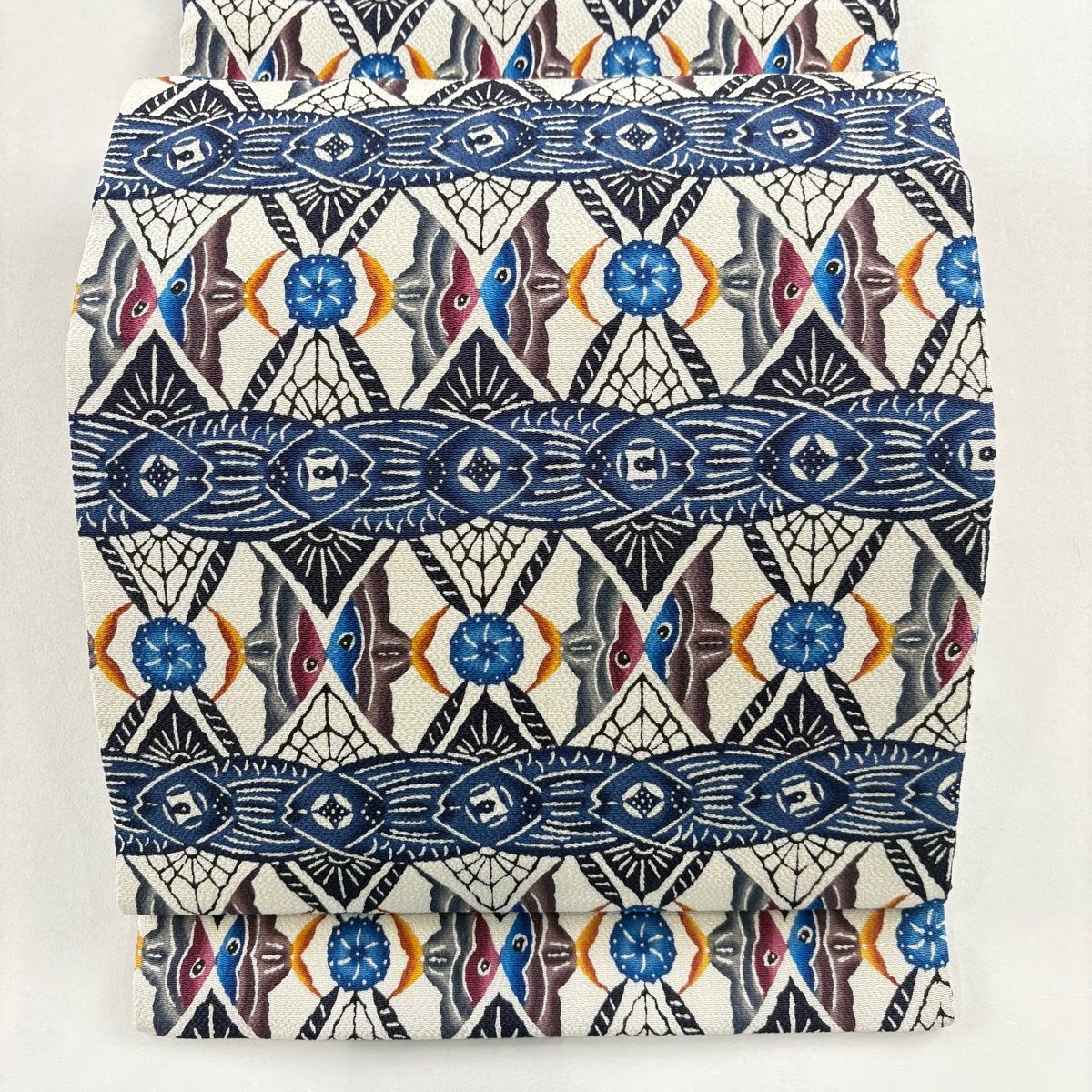 開き名古屋帯 城間栄順 落款 魚 幾何学模様 紺色 正絹