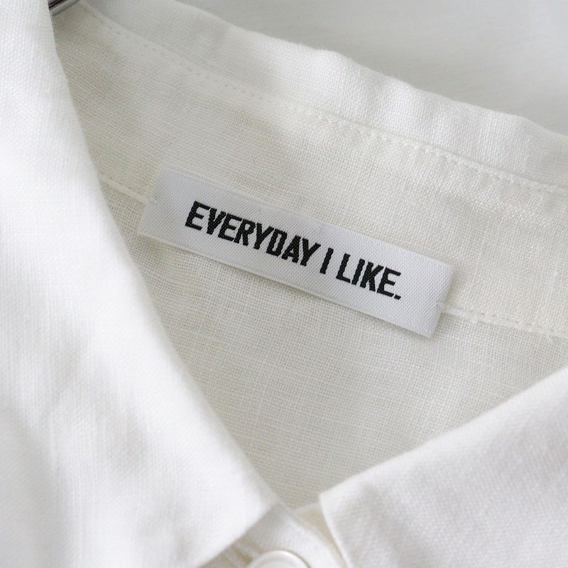 ホワイト トップス