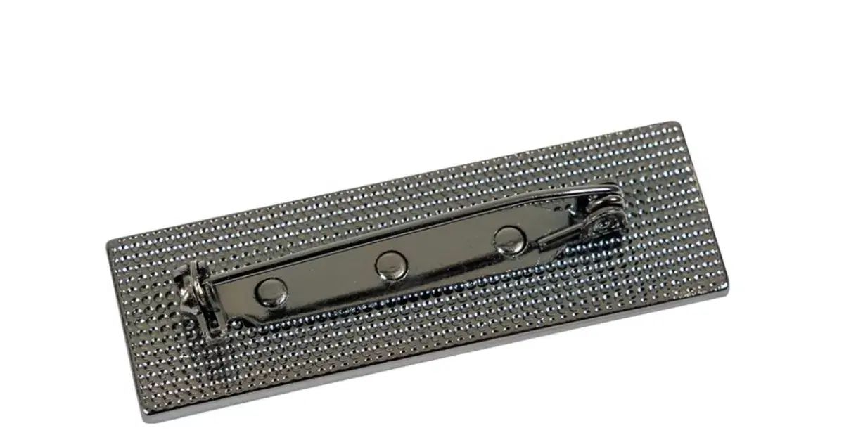 X ORDINARY BROOCH ロゴ ブローチ