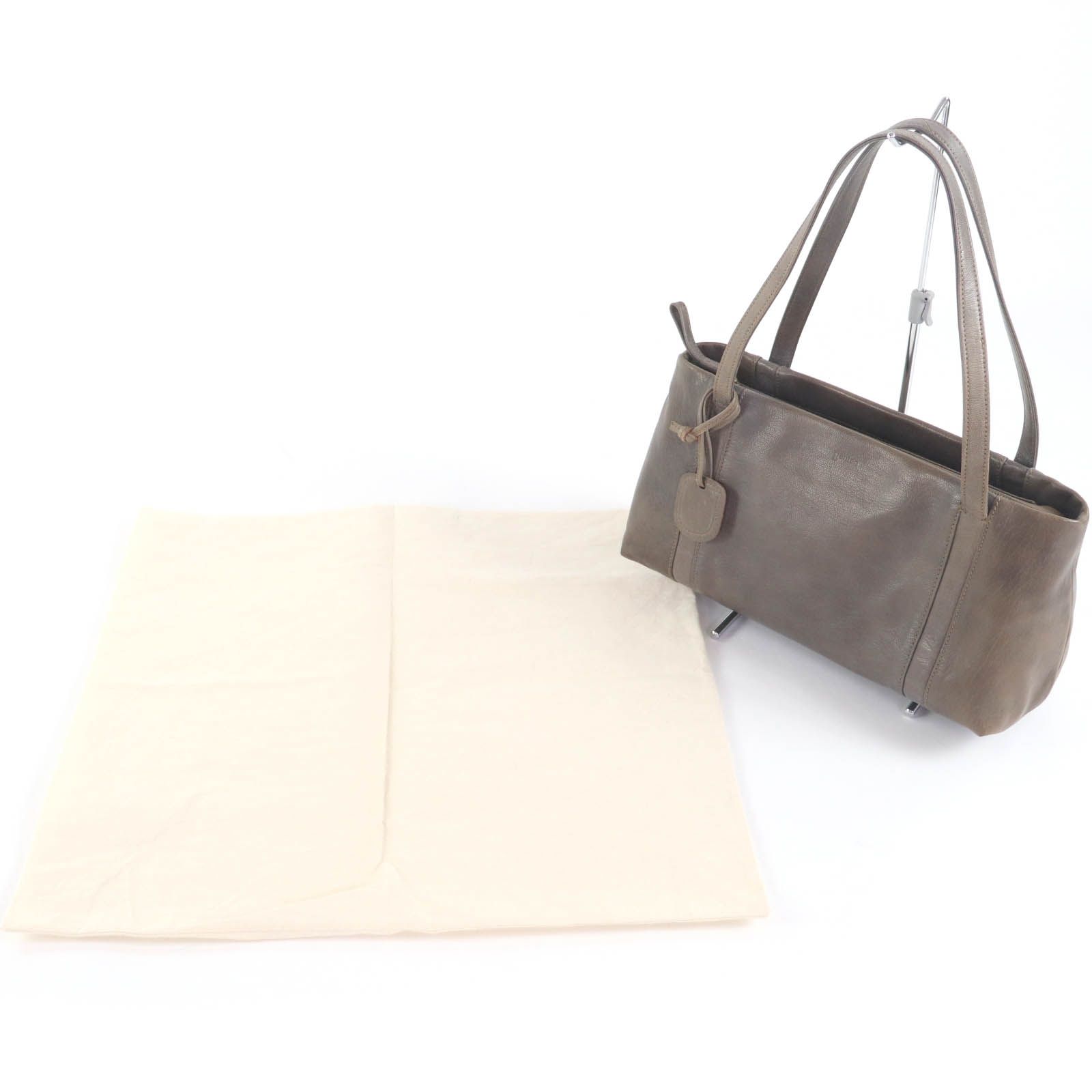 極美品　保存袋付き　ゲンテン　ハンドバッグ ゴートヌメ　横長　ロゴ型押し　黒　革 極美品 保存袋付き ゲンテン ハンドバッグ ゴートヌメ 横長 ロゴ型押し