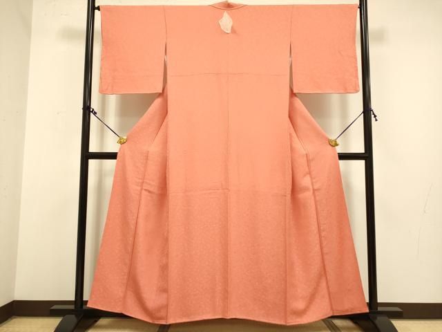 平和屋着物 上質な色無地 吉祥花地紋 赤丹色 正絹 du