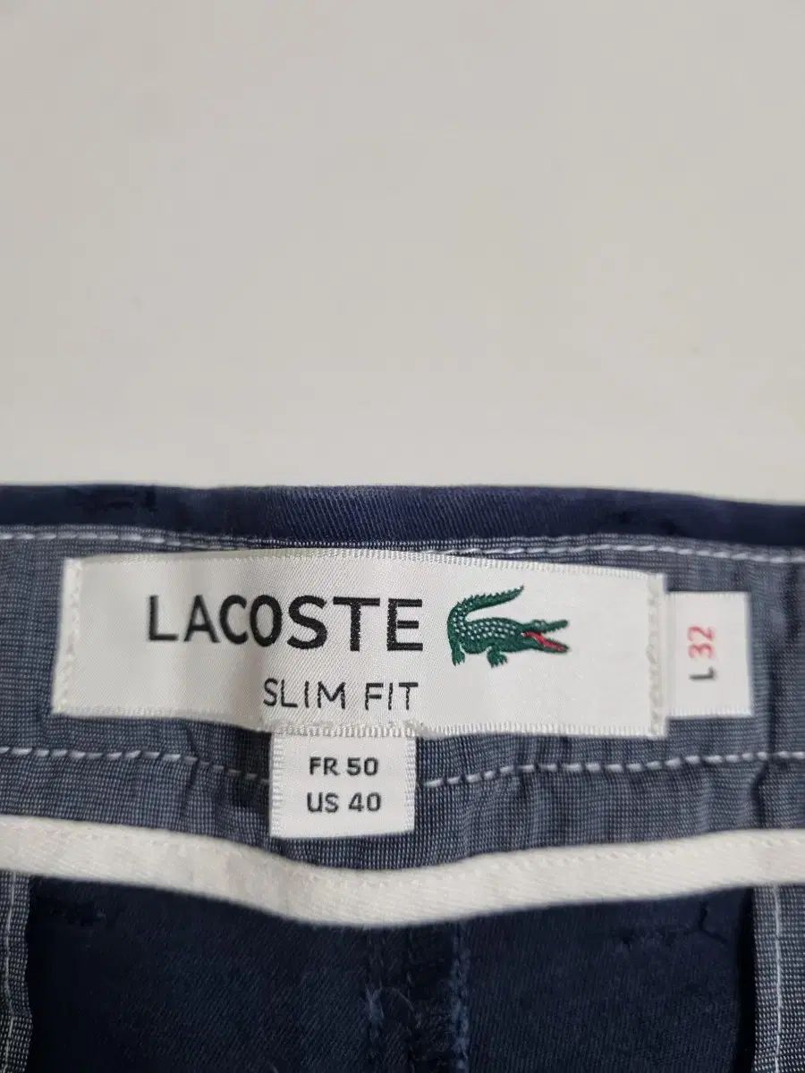36 ラコステ ネイビー 冬 ストレッチ パンツ チノパンツ チノパン パンツ メンズ