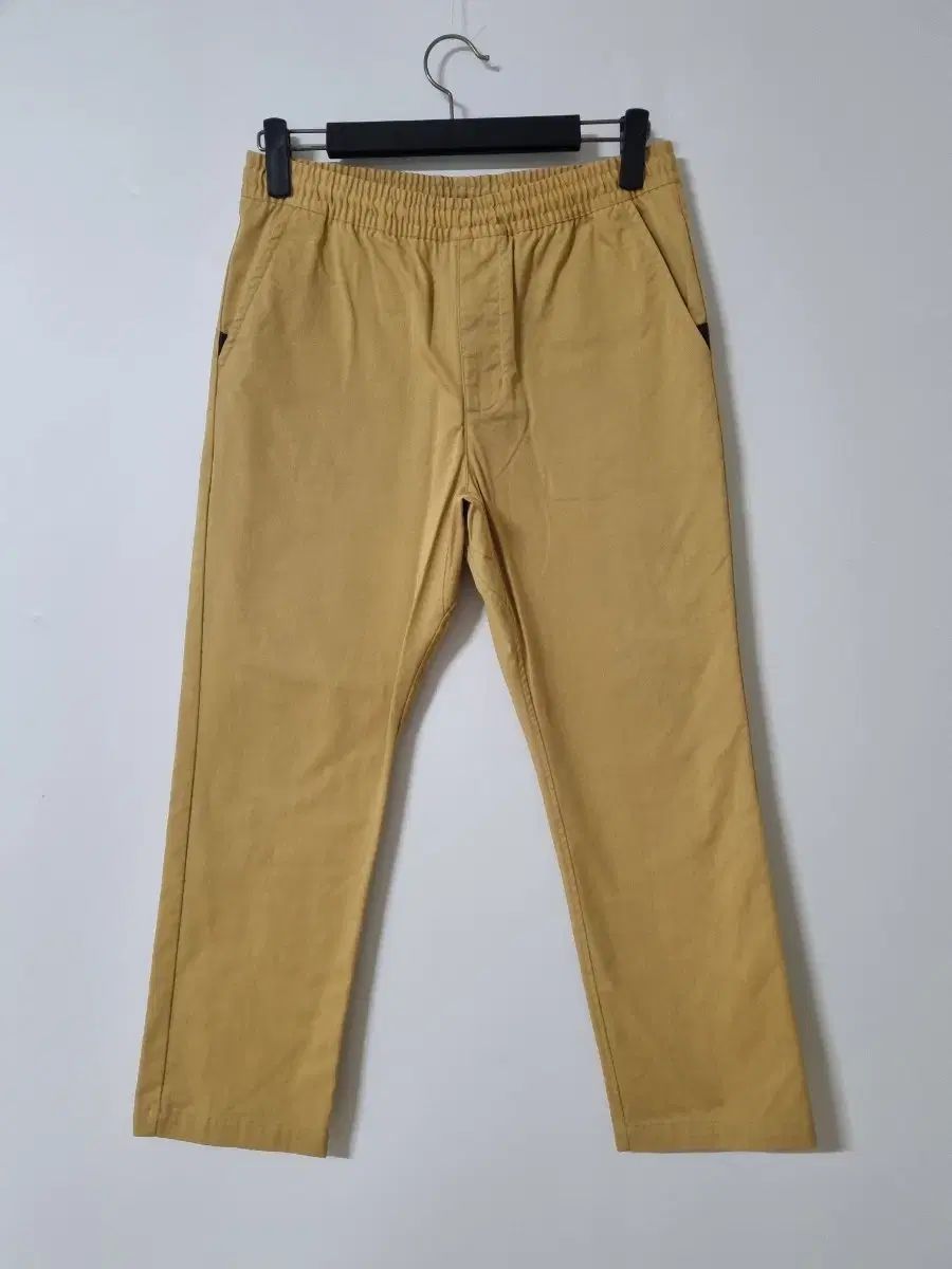 34 NIKE バンディング 黄土色 冬 ストレッチ パンツ チノパンツ