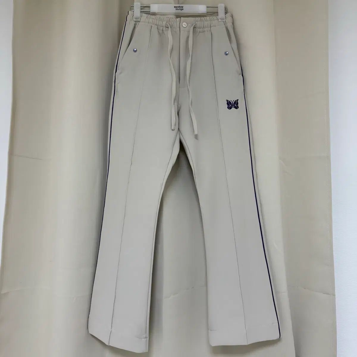 ニードルズ パイピング カウボーイ ブーツカット パンツ