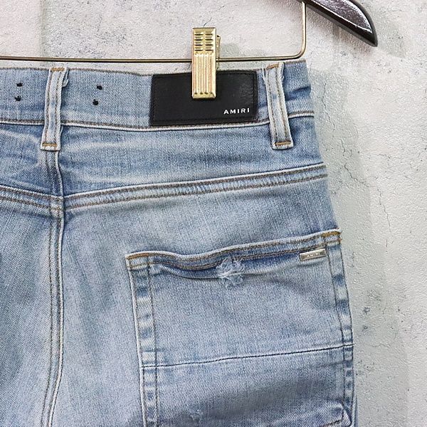 広尾店】 AMIRI アミリ ストレッチスキニーデニム ダメージ加工 ボタン