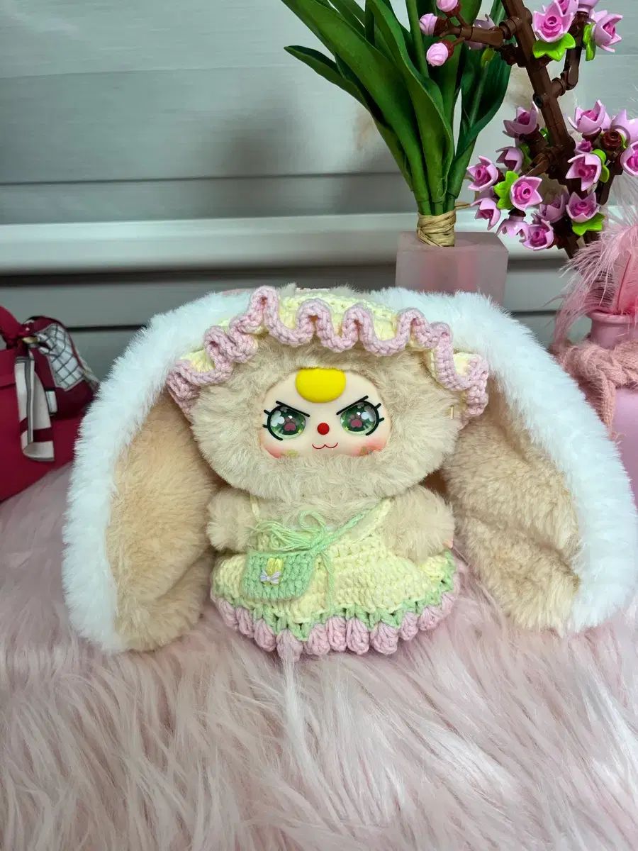 ベビー 顔 編み物服を着せたアイ