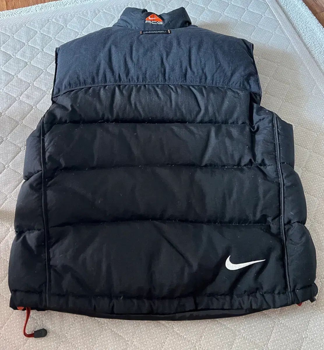 ナイキ acg ダウンベスト - メルカリ